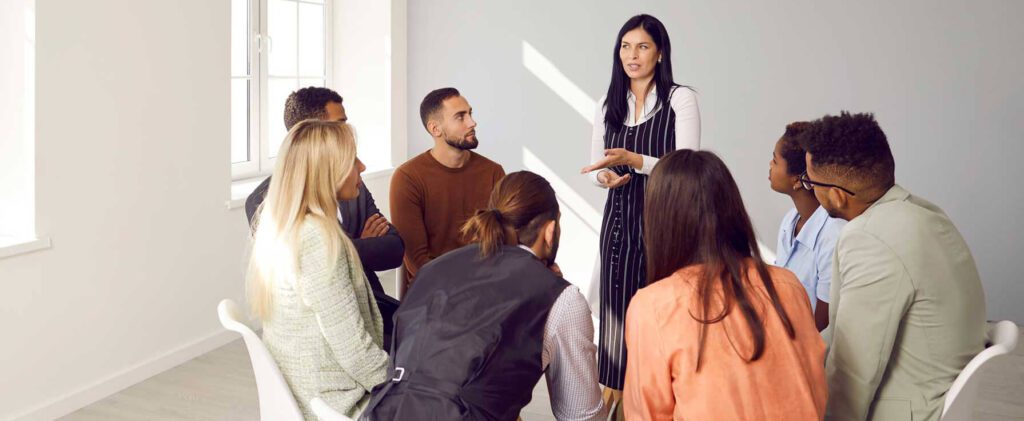 Group therapy at a facility that offers free alcohol and drug addiction assessments